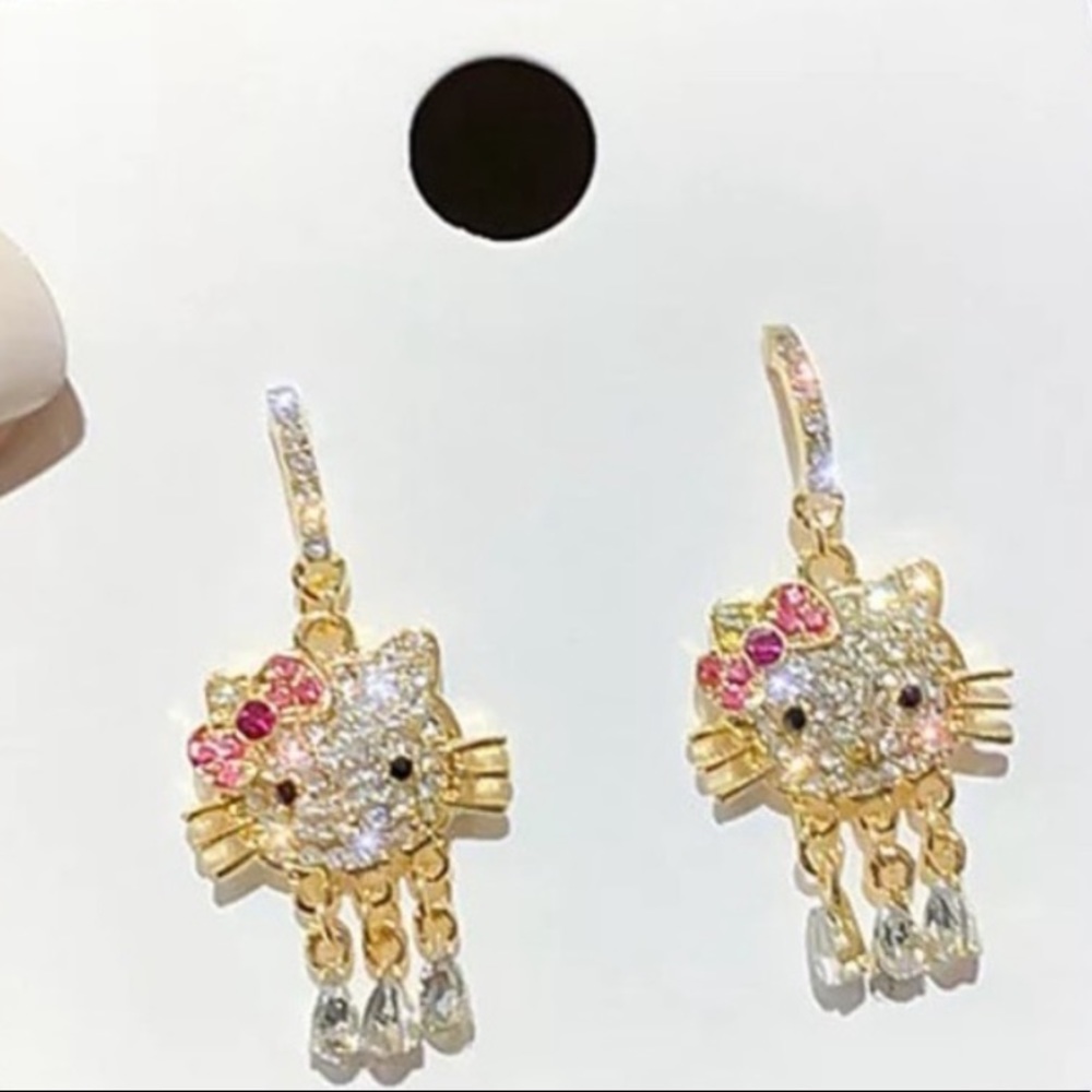ANY PAIR UNDER $25 R 4 FOR $20 Hello kitty’s twin sister Mimmy.